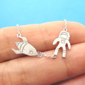 Spaceship and Astronaut Space Travel Themed Charm Necklace in Silver | DOTOLY